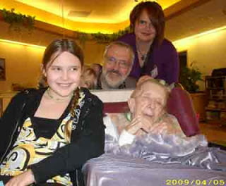 Robert Runte with wife and daughters on his mother's 100th birthday